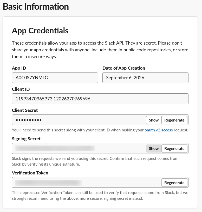 The App Credentials panel: App ID and Client ID are safe to leave visible, Client Secret and Signing Secret are masked, and the deprecated Verification Token is blocked out since unlike the other two it isn't masked by default